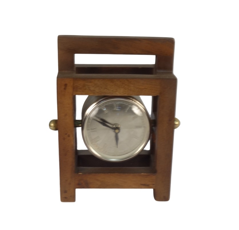 Iron clock in wooden square frame
